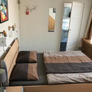 Postel nebo postele na pokoji v ubytování Hotel Pieter de Coninck