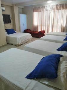 Cama o camas de una habitación en Hotel Santa Fe