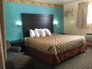 Postel nebo postele na pokoji v ubytování Best Motel