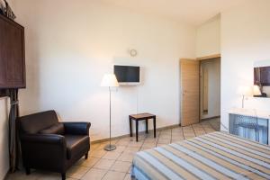 TV a/nebo společenská místnost v ubytování Casale Belvedere vista mare + 37 fotografií
