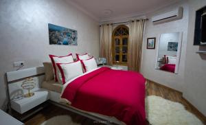 Voodi või voodid majutusasutuse Hôtel ZIRYAB toas