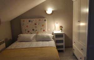 Ліжко або ліжка в номері Apartamentos GO - Tordesillas House