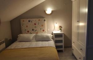 Postel nebo postele na pokoji v ubytování Apartamentos GO - Tordesillas House