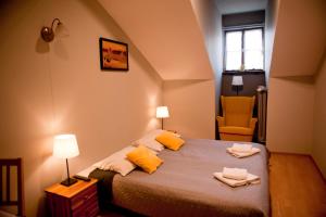 Llit o llits en una habitació de Dom Casimi