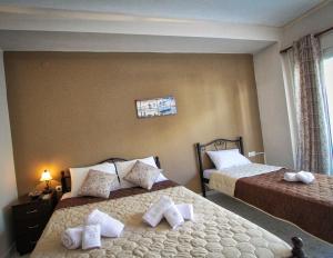 A bed or beds in a room at Arianna Studios 7
