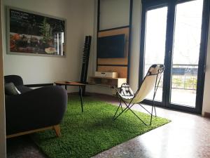 A television and/or entertainment centre at Semedaki, a modern appartment in the centre of history