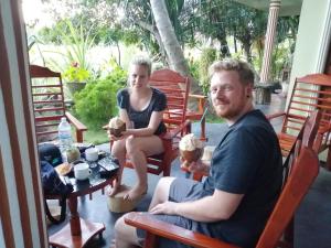 a man and a little girl sitting on chairs at Viveka Inn Guest and Yala Safari in Tissamaharama +36 photos