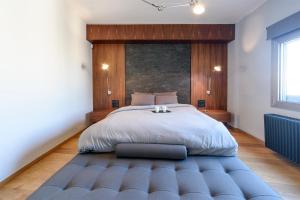 Postel nebo postele na pokoji v ubytování Acropolis Dream Apartment