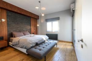 Postel nebo postele na pokoji v ubytování Acropolis Dream Apartment