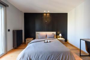 Postel nebo postele na pokoji v ubytování Acropolis Dream Apartment