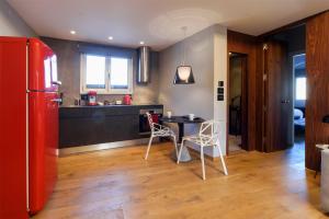 Kuchyň nebo kuchyňský kout v ubytování Acropolis Dream Apartment