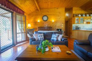 Posezení v ubytování Silky Oak Cottage + 20 fotografií