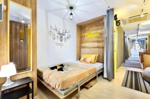 Postel nebo postele na pokoji v ubytování hipstercity hostel