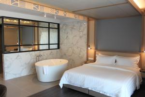 Кровать или кровати в номере Anana Ecological Resort Krabi - SHA Extra Plus