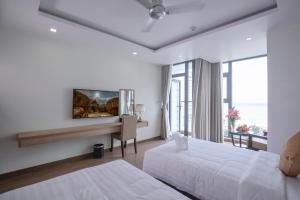 Postel nebo postele na pokoji v ubytování Sata Hotel