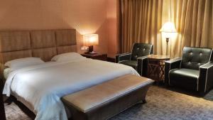 Letto o letti in una camera di Kai Wei Boutique Hotel