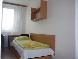 Postel nebo postele na pokoji v ubytování Koleje J.A.Komenského