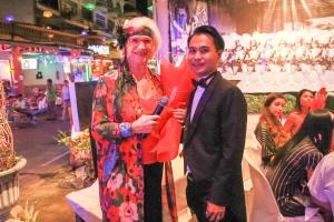 a man and a woman standing next to each other at Poseidon Boutique Hotel in Pattaya South