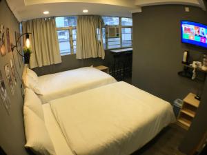 Postelja oz. postelje v sobi nastanitve Soso Hostel