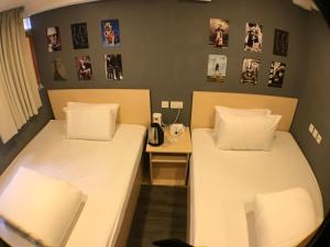Postelja oz. postelje v sobi nastanitve Soso Hostel