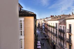 a city street filled with lots of buildings at Hostal La Numantina in Logroño