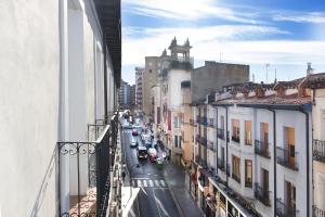 a view of a city street with cars on the road at Hostal La Numantina in Logroño