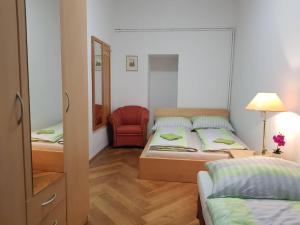 Posteľ alebo postele v izbe v ubytovaní Ferienwohnung Schloessel 26/16