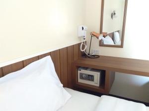Baan Wanchart客房内的一张或多张床位