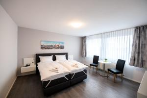 Ένα ή περισσότερα κρεβάτια σε δωμάτιο στο Parkhotel Nordwalde