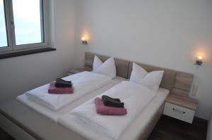Łóżko lub łóżka w pokoju w obiekcie Zugspitzappartements