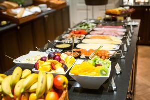 a buffet line with many different types of food at Vihula Manor Country Club & Spa in Vihula