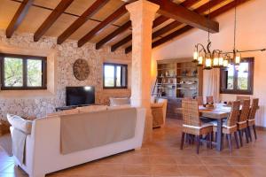 a living room with a couch and a table at 065 Finca Son Costa ETV4943 by Mallorca Charme in Búger