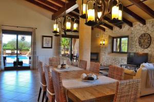 a dining room with a table and chairs at 065 Finca Son Costa ETV4943 by Mallorca Charme in Búger
