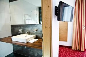 TV a/nebo společenská místnost v ubytování Chalet Barbara
