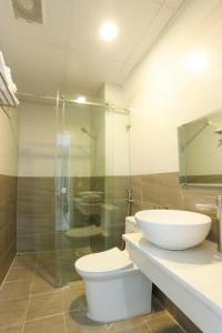 Koupelna v ubytování Lacami Dalat Hotel + 37 fotografií