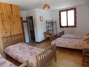 Lova arba lovos apgyvendinimo įstaigoje Maison d' hôtes Tranquyl