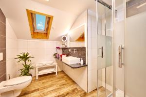 Koupelna v ubytování Hotel Franziska