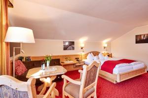 Postel nebo postele na pokoji v ubytování Hotel Franziska