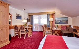 TV a/nebo společenská místnost v ubytování Hotel Franziska