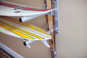 a group of surfboards sitting on a rack at The Salt House, Fore Street in Ilfracombe