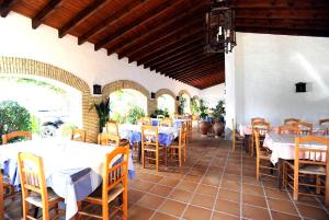 Restaurace v ubytování Hostal El Capi