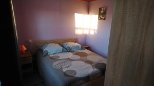 Кровать или кровати в номере Chalet de vacances
