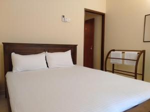 Postel nebo postele na pokoji v ubytování New Sanmi Resort