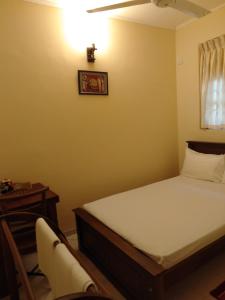 Postel nebo postele na pokoji v ubytování New Sanmi Resort