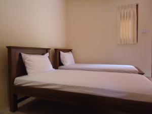 Postel nebo postele na pokoji v ubytování New Sanmi Resort + 28 fotografií