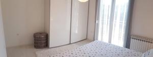Postel nebo postele na pokoji v ubytování Apartment Bezic