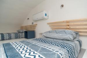 a bedroom with a bed at Il Pagliaio B&B in Mattinata
