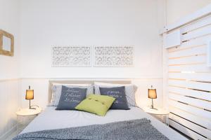 Postel nebo postele na pokoji v ubytování VATICAN independent with garden - Bambin Gesu H