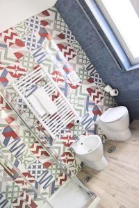 Ванная комната в La Casa del Corallo +22 фотографии