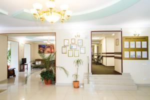 an office lobby with a hallway with a mirror at Health Resort Dolina Narzanov Nalchik in Nalchik